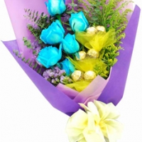 - 6 blue Roses and 6 Ferrero Rocher